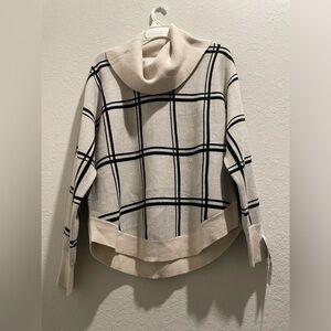 Loose turtle neck fall sweater. Cream with black stripes. New with tag